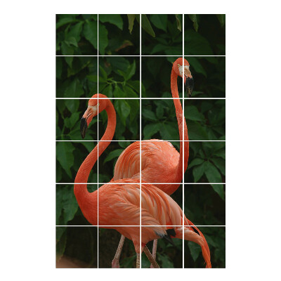 Vízálló csempe matrica Flamingók a levelek hátterében