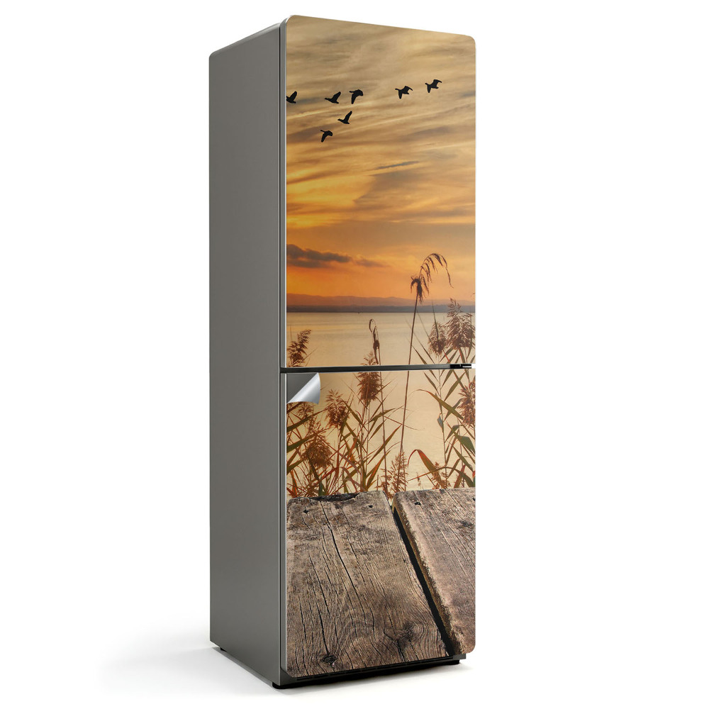 Hűtő dekor matrica Naplemente a víz felett