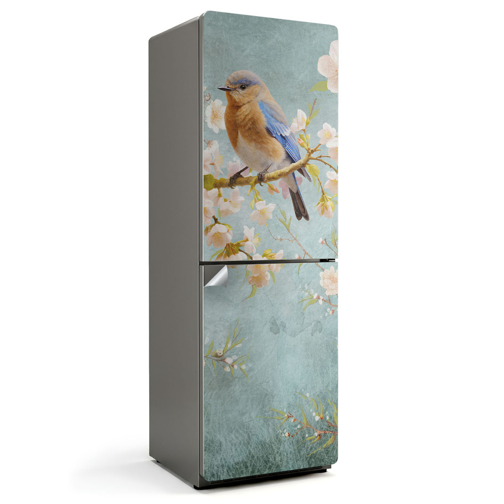 Dekor matrica hűtőre Egy madár egy virágos ágon
