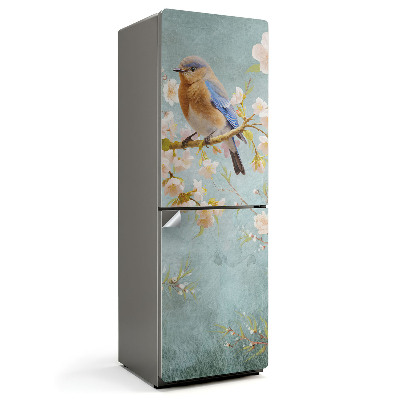 Dekor matrica hűtőre Egy madár egy virágos ágon