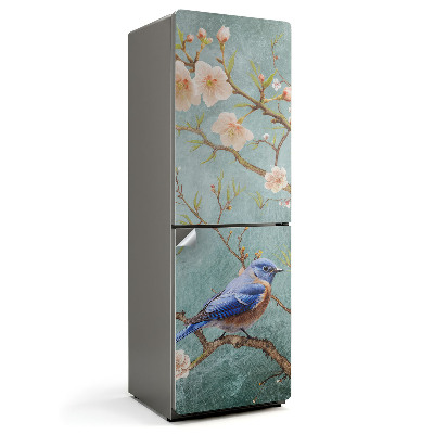 Hűtő dekor matrica Egy madár egy virágos ágon
