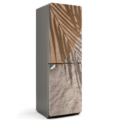 Hűtő dekor matrica Egy pálmafa árnyéka a homokban